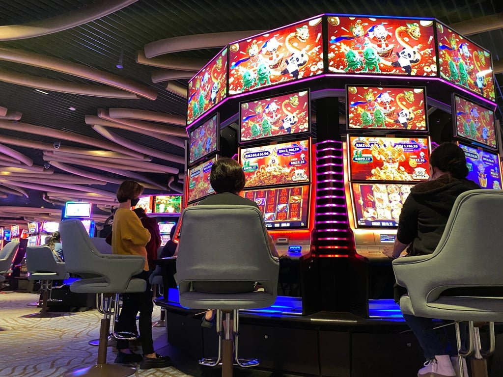 People at the SkyCasino in Genting Highlands. The resort dominates Malaysia’s domestic gambling scene. Photo: Shutterstock People at the SkyCasino in Genting Highlands. The resort dominates Malaysia’s domestic gambling scene. Photo: Shutterstock
