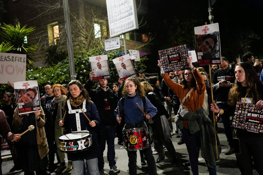 Relatives and supporters of the Israeli hostages held in Gaza by Hamas attend a protest calling for their release outside Israeli Prime Minister Benjamin Netanyahu’s home in Jerusalem, Sunday. Photo: AP