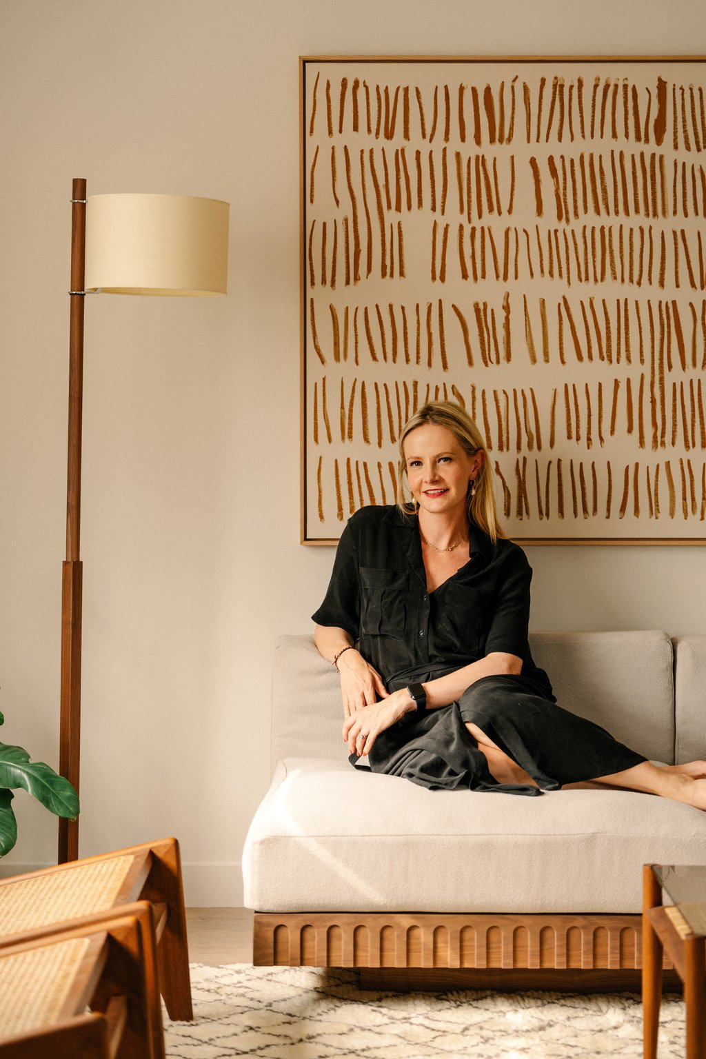 Interior designer Jocelyn Liipfert Lam on the sofa she designed and Hardwood HK made for the home in South Lantau. Behind her is an artwork commissioned from Spanish artist Bea Aiguabella. Photo: Common Studio Interior designer Jocelyn Liipfert Lam on the sofa she designed and Hardwood HK made for the home in South Lantau. Behind her is an artwork commissioned from Spanish artist Bea Aiguabella. Photo: Common Studio