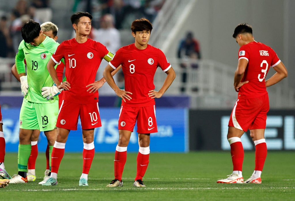 Hong Kong’s players were crushed after losing their decisive Asian Cup match against Palestine. Photo: Reuters Hong Kong’s players were crushed after losing their decisive Asian Cup match against Palestine. Photo: Reuters