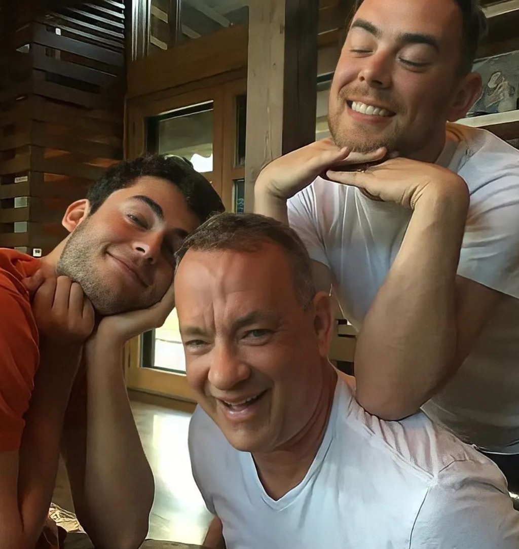 Tom Hanks, dwarfed by sons Truman and Chet Hanks. Photo: @tomhanksfanworld/Instagram Tom Hanks, dwarfed by sons Truman and Chet Hanks. Photo: @tomhanksfanworld/Instagram