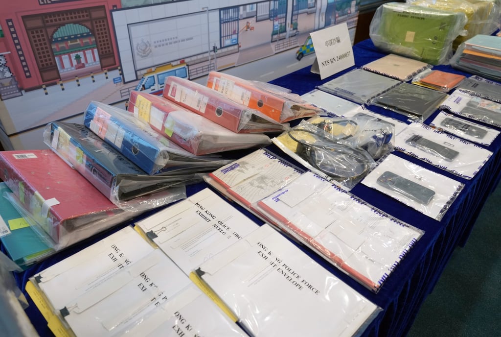 Police displays the evidence in a HK$50 million fraud case involving decades-old Christian Zheng Sheng Association at a media conference. Photo: Sam Tsang