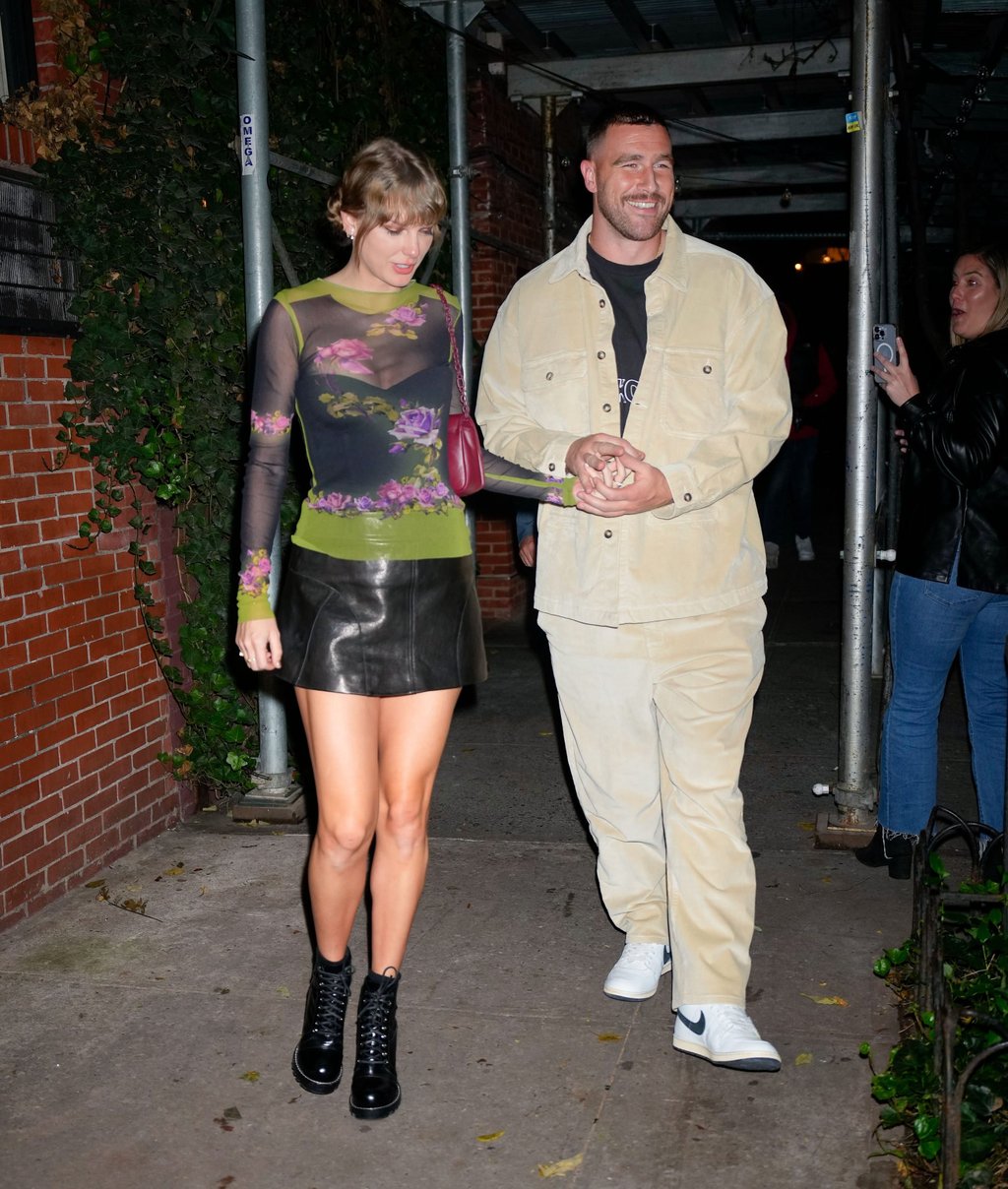 Taylor Swift and Travis Kelce, whose romance has dominated the tabloid pages of 2023. Photo: Gotham/GC Images