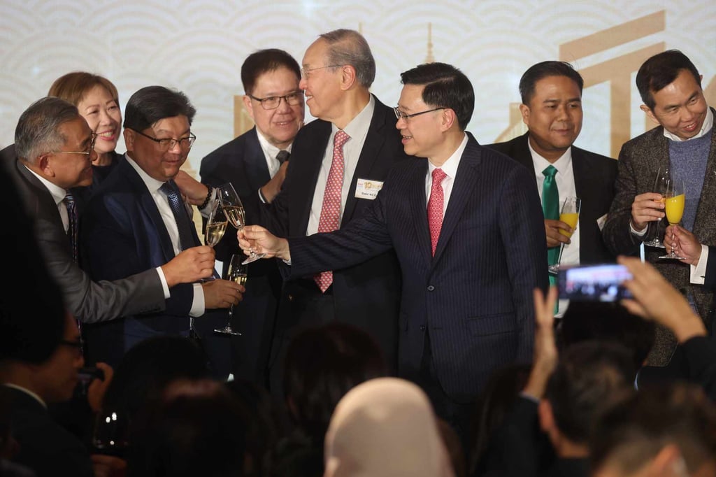 City leader John Lee (third right) toasts the Malaysian Chamber of Commerce at a reception to mark its 10th anniversary in Hong Kong. Photo: Edmond So City leader John Lee (third right) toasts the Malaysian Chamber of Commerce at a reception to mark its 10th anniversary in Hong Kong. Photo: Edmond So