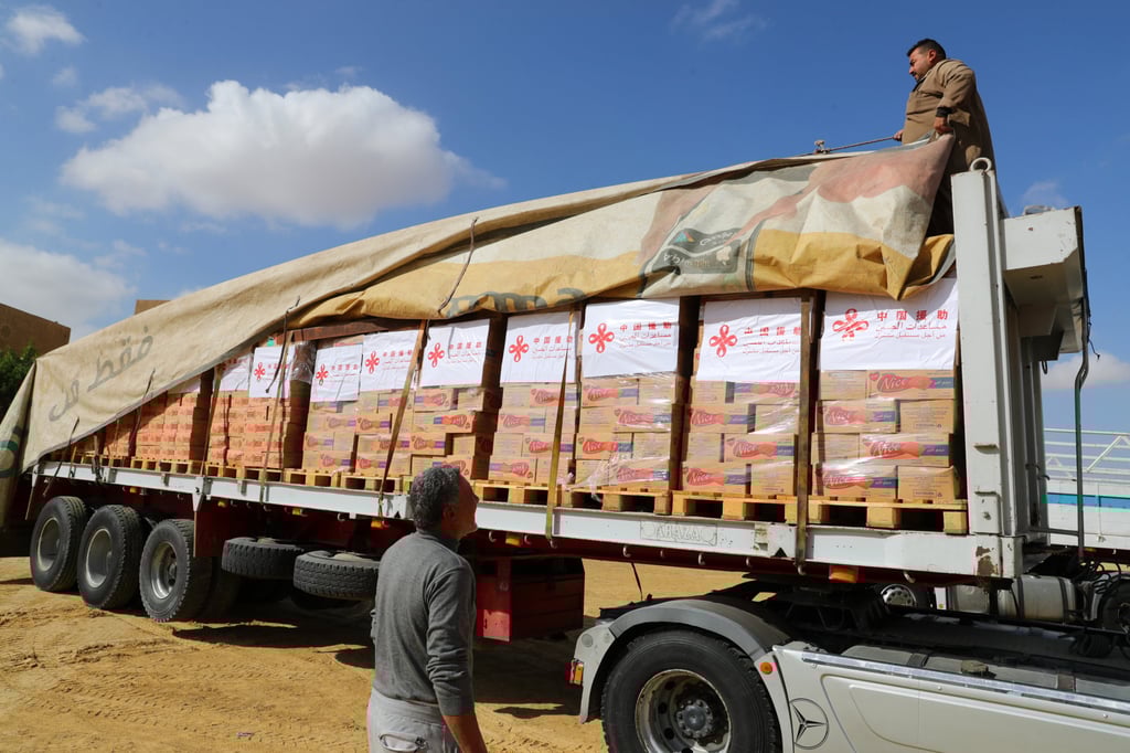 A truck carrying Chinese humanitarian aid to Gaza waits for departure in Cairo, Egypt on November 27. China says it has supplied aid, but not weapons, to Palestine. Photo: Xinhua