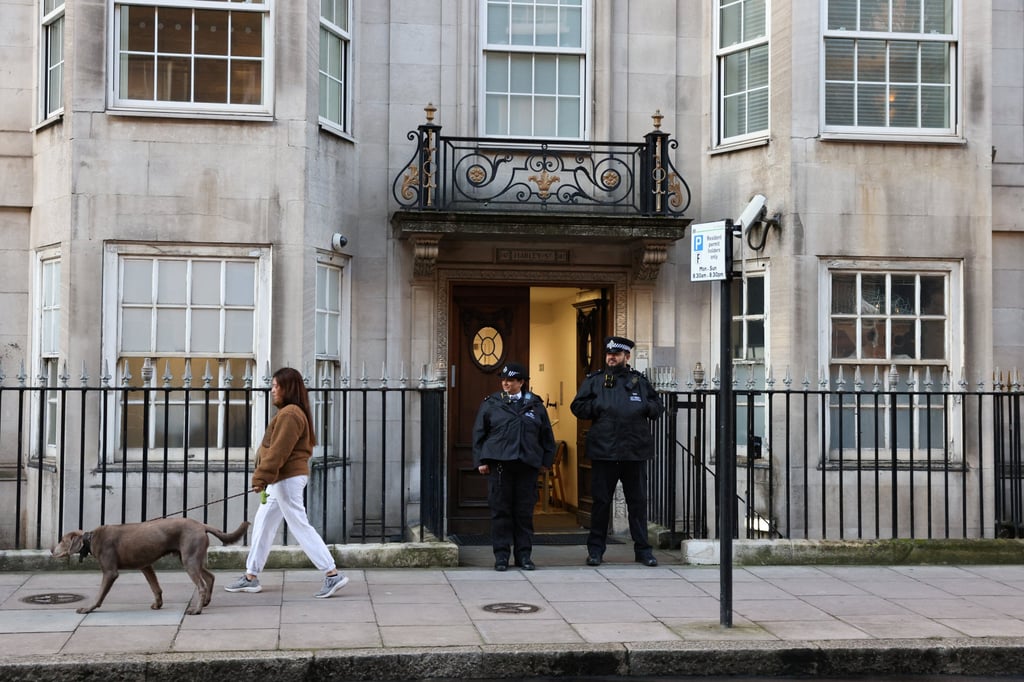 Police stand outside The London Clinic where Britain’s King Charles is receiving treatment for an enlarged prostate. Photo: Reuters