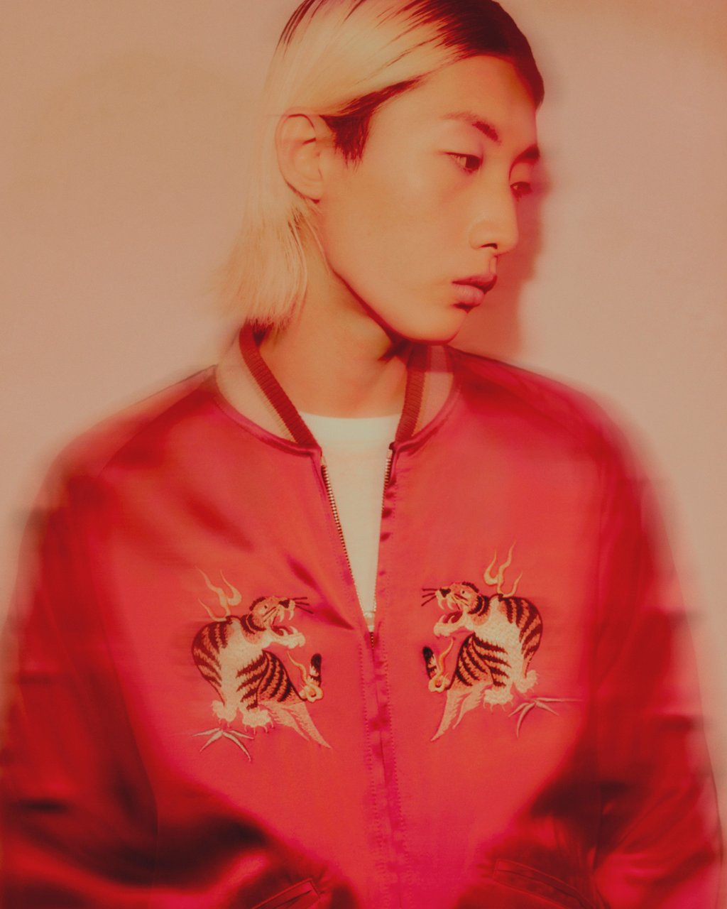 Kenzo’s Year of the Dragon collection includes a women’s bomber jacket in red with an “8” dragon graphic on the back and tigers on the chest