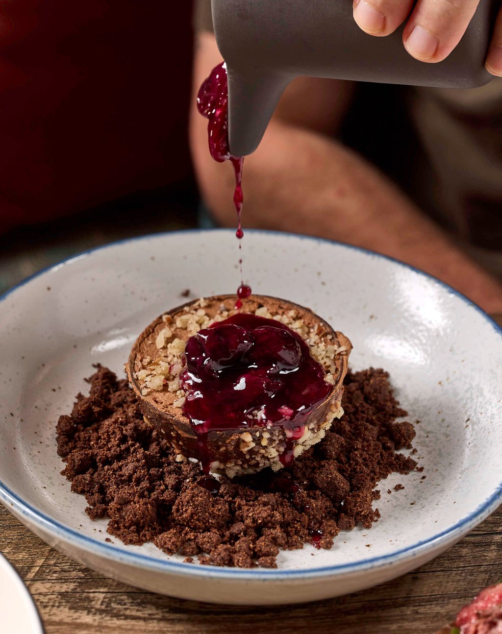 Uma Nota’s Valentine’s Day Menu includes a chocolate mousse with Brazil nuts, chocolate crumble and wild berry coulis. Photo: Uma Nota