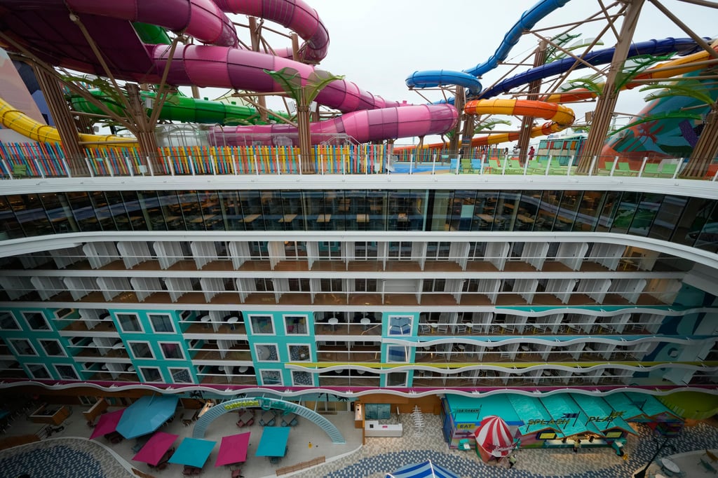 Waterslides are seen atop a deck overlooking floors of rooms aboard Icon of the Seas, the world’s largest cruise ship, on January 11. Photo: AP