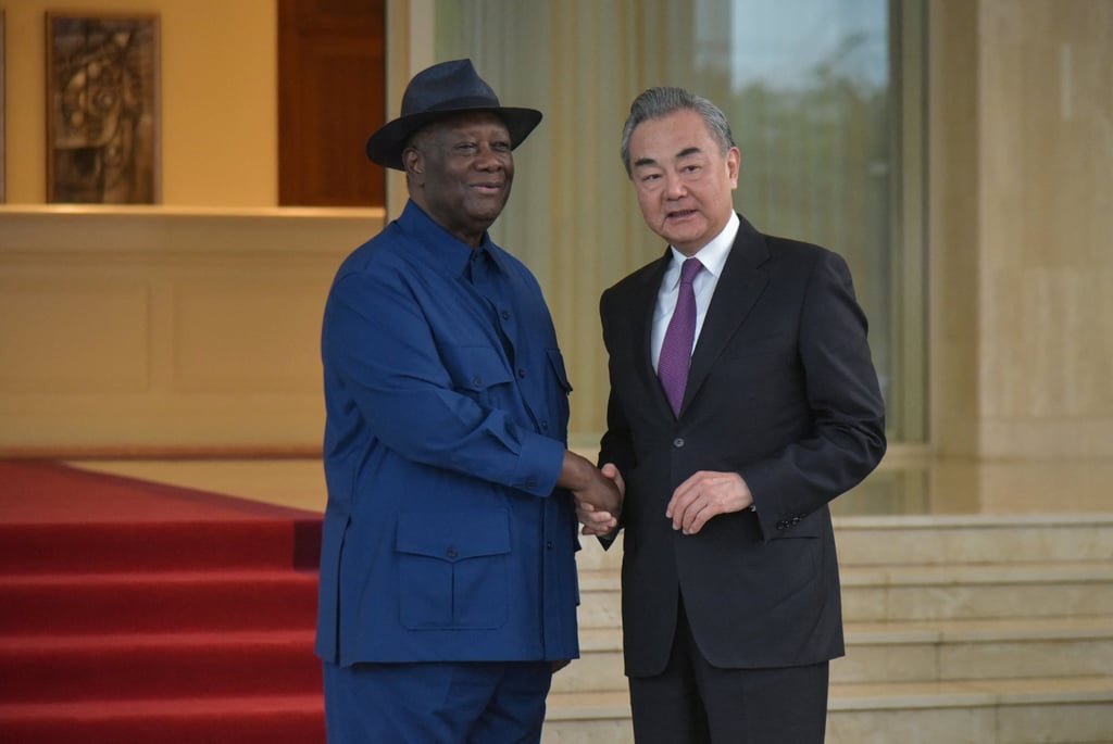 Chinese Foreign Minister Wang Yi with Ivorian President Alassane Ouattara in Abidjan earlier this month. Photo: Reuters