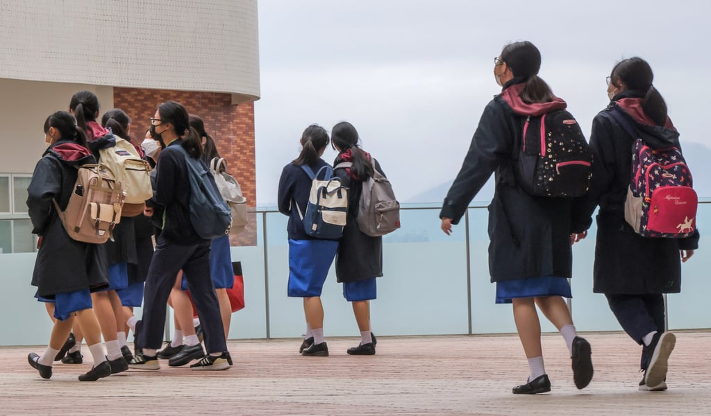 Students return to campus at Ying Wa Girls’ School. The two-month-old “Three-Tier School-based Emergency Mechanism” was extended to December 31. Photo: Jelly Tse