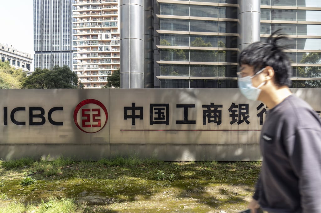 A man passed an Industrial and Commercial Bank of China (ICBC) branch in Shanghai. Photo: Bloomberg A man passed an Industrial and Commercial Bank of China (ICBC) branch in Shanghai. Photo: Bloomberg