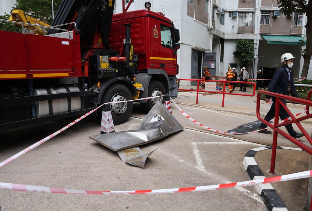 The twisted metal door after the explosion. Photo: Jelly Tse The twisted metal door after the explosion. Photo: Jelly Tse