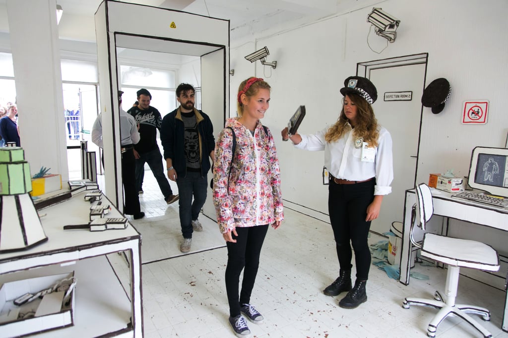 To enter Dismaland, visitors had to go through a mock security control. Photo: Getty Images