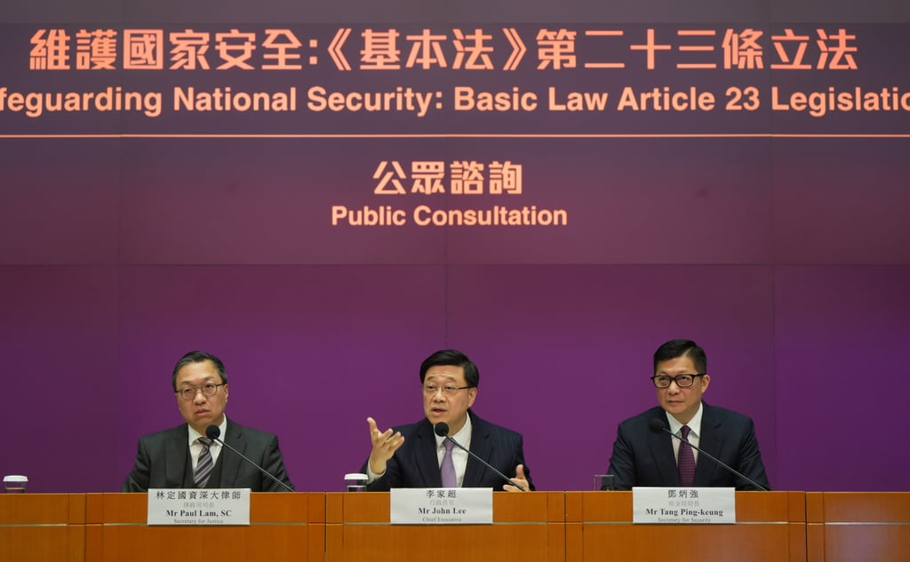 (From left) Justice minister Paul Lam, city leader John Lee and security chief Chris Tang. Photo: Sam Tsang (From left) Justice minister Paul Lam, city leader John Lee and security chief Chris Tang. Photo: Sam Tsang