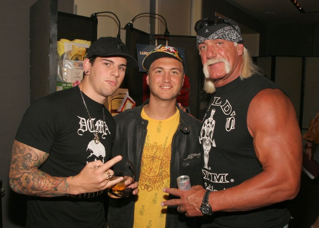 Nick Hogan (centre) with his dad Hulk Hogan at a radio station event in 2006. Photo: @sounding_the_city_of_nightmare/Instagram Nick Hogan (centre) with his dad Hulk Hogan at a radio station event in 2006. Photo: @sounding_the_city_of_nightmare/Instagram