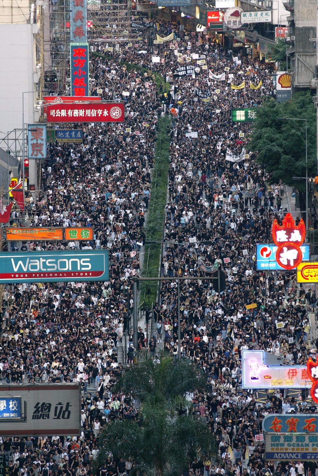 Crowds march from Victoria Park in Causeway Bay to the government offices in Admiralty in a 2003 protest against the original national security legislation. Photo: Martin Chan Crowds march from Victoria Park in Causeway Bay to the government offices in Admiralty in a 2003 protest against the original national security legislation. Photo: Martin Chan