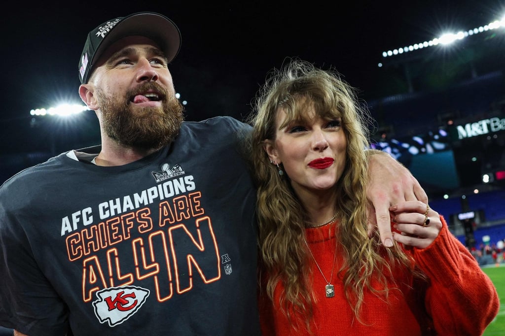 Travis Kelce of the Kansas City Chiefs celebrates with Taylor Swift after a 17-10 victory against the Baltimore Ravens in the AFC Championship Game at M&T Bank Stadium in Baltimore on Sunday. Photo: TNS Travis Kelce of the Kansas City Chiefs celebrates with Taylor Swift after a 17-10 victory against the Baltimore Ravens in the AFC Championship Game at M&T Bank Stadium in Baltimore on Sunday. Photo: TNS