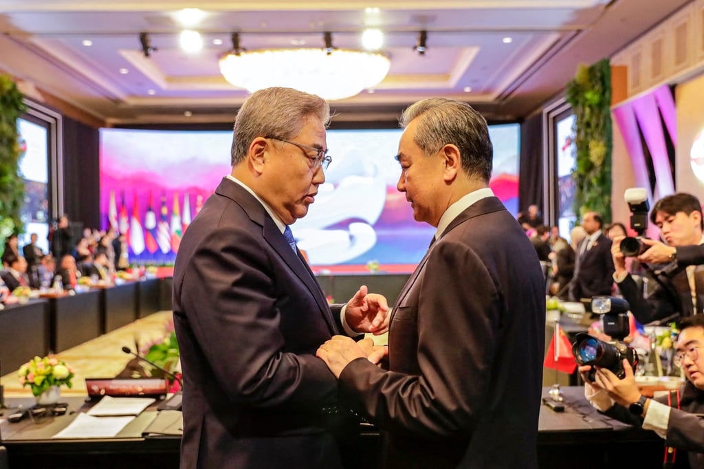 Chinese Foreign Minister Wang Yi (right) with former South Korean counterpart Park Jin in Jakarta last year. Photo: AFP Chinese Foreign Minister Wang Yi (right) with former South Korean counterpart Park Jin in Jakarta last year. Photo: AFP