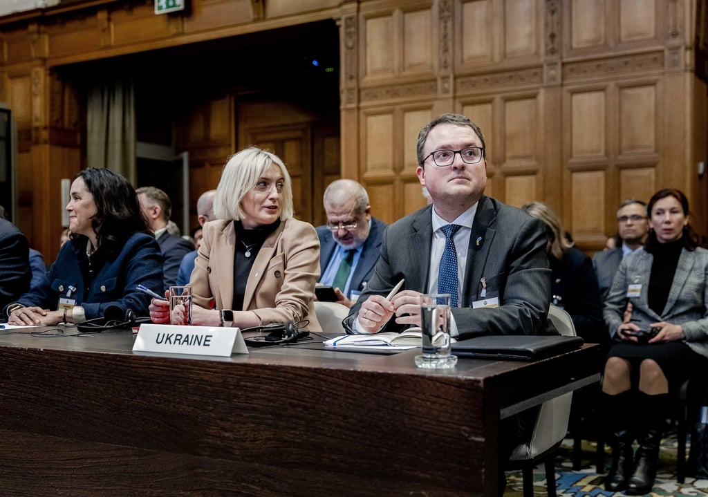 Oksana Zolotaryova (centre), director general for international law, Ministry of Foreign Affairs of Ukraine, and Anton Korynevych (right), ambassador-at-large, Ministry of Foreign Affairs of Ukraine, are seen on Wednesday before the ruling. Photo: EPA-EFE Oksana Zolotaryova (centre), director general for international law, Ministry of Foreign Affairs of Ukraine, and Anton Korynevych (right), ambassador-at-large, Ministry of Foreign Affairs of Ukraine, are seen on Wednesday before the ruling. Photo: EPA-EFE