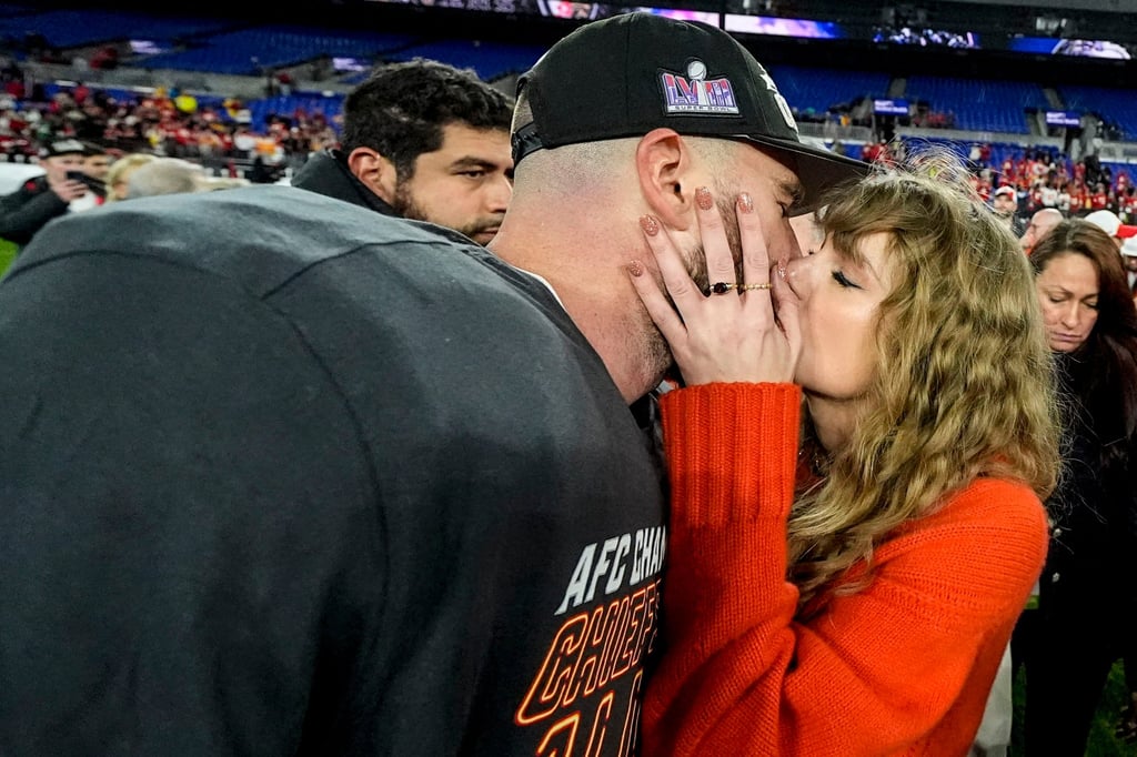 Taylor Swift kisses Kansas City Chiefs tight end Travis Kelce after an AFC Championship NFL football game against the Baltimore Ravens, on January 28, in Baltimore. Photo: AP Photo Taylor Swift kisses Kansas City Chiefs tight end Travis Kelce after an AFC Championship NFL football game against the Baltimore Ravens, on January 28, in Baltimore. Photo: AP Photo