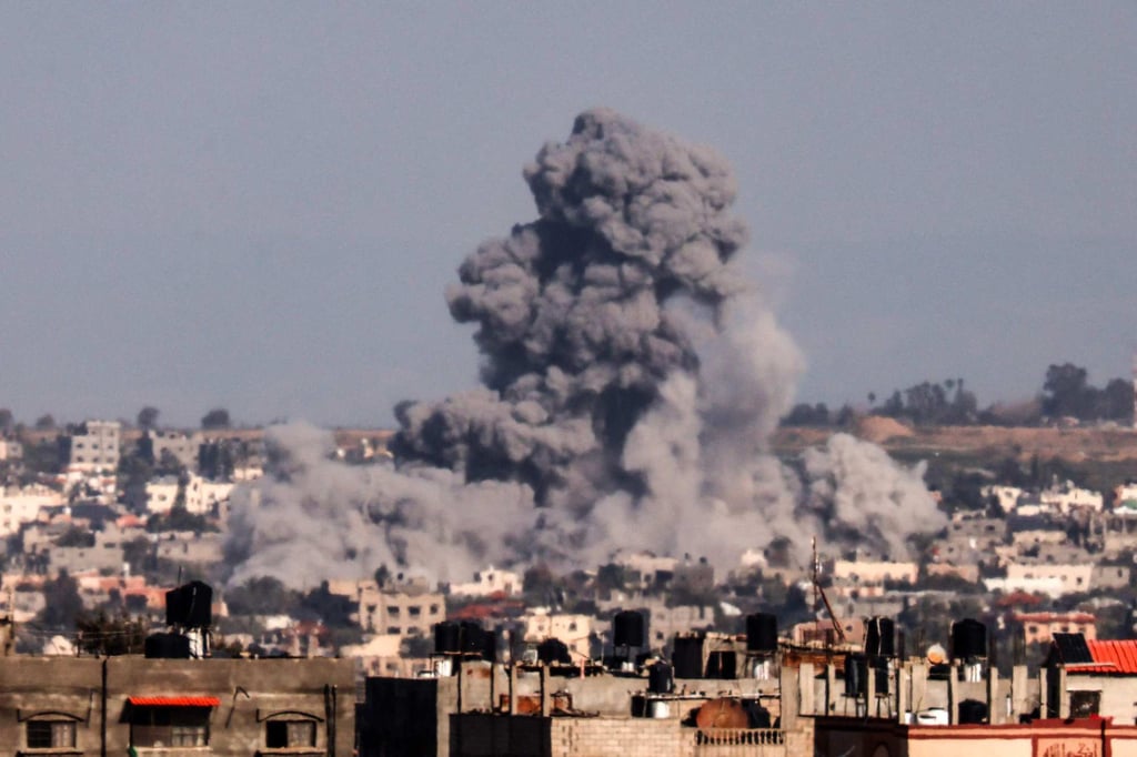 This picture taken from Rafah, in the southern Gaza Strip, shows smoke rising over buildings in Khan Younis during Israeli bombardment. Photo: AFP This picture taken from Rafah, in the southern Gaza Strip, shows smoke rising over buildings in Khan Younis during Israeli bombardment. Photo: AFP