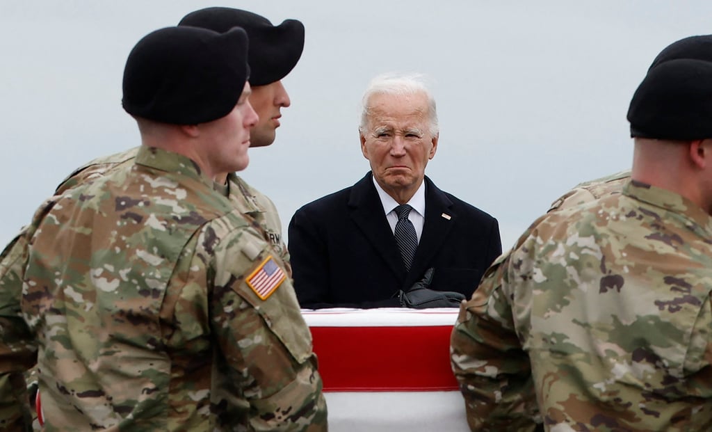 US President Joe Biden places his hand over his heart during a dignified transfer ceremony at Dover Air Force Base in Delaware on Friday. Photo: AFP US President Joe Biden places his hand over his heart during a dignified transfer ceremony at Dover Air Force Base in Delaware on Friday. Photo: AFP