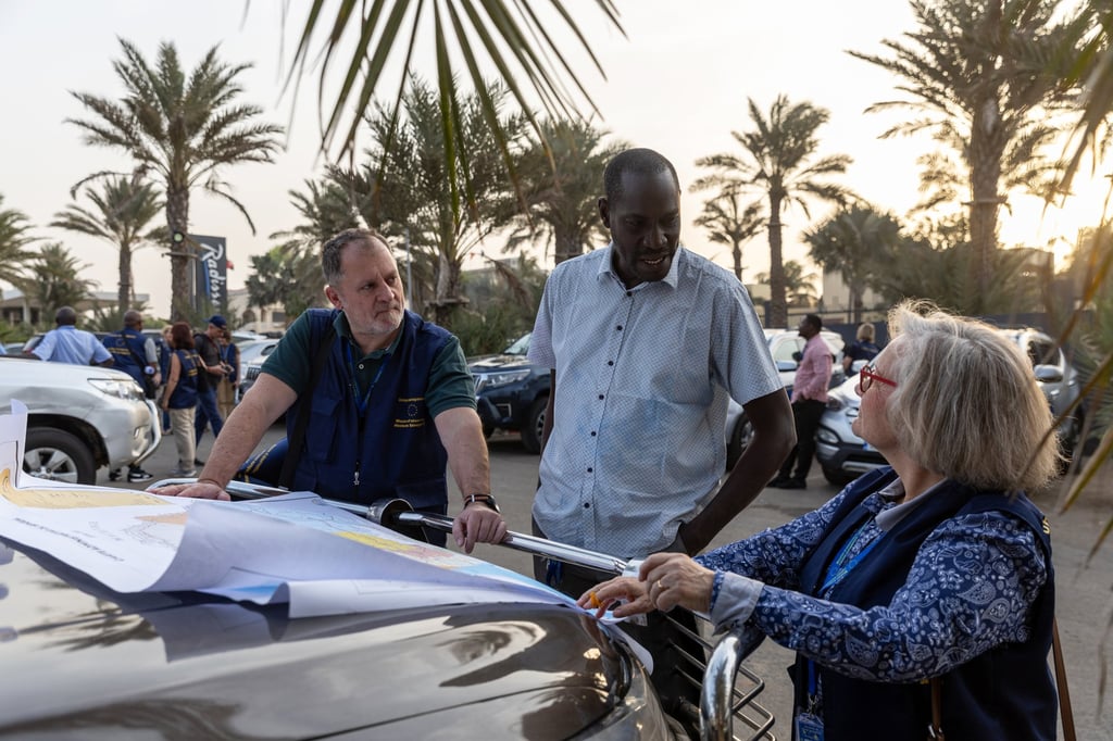 Election observers from the European Union study a map of Senegal before being dispatched to their respective locations in Dakar, Senegal on Friday. Photo: EPA-EFE Election observers from the European Union study a map of Senegal before being dispatched to their respective locations in Dakar, Senegal on Friday. Photo: EPA-EFE