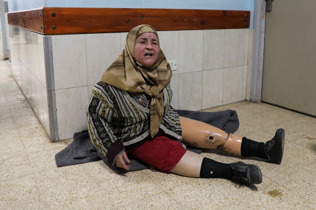 A Palestinian woman shelters at hospital. Photo: Reuters A Palestinian woman shelters at hospital. Photo: Reuters