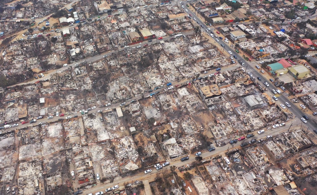 An aerial view of Quilpue, a devastated hillside community near Vina del Mar, Chile. Photo: AFP An aerial view of Quilpue, a devastated hillside community near Vina del Mar, Chile. Photo: AFP