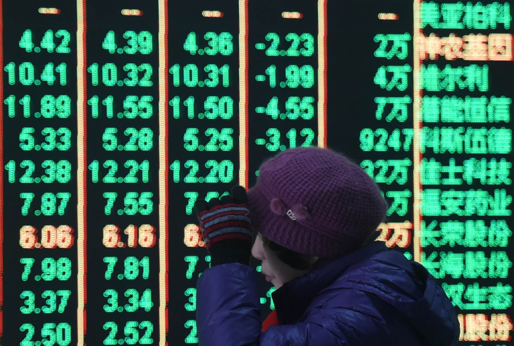 A customer at a stock exchange in Hangzhou, capital of China’s Zhejiang Province. Photo: Getty Images