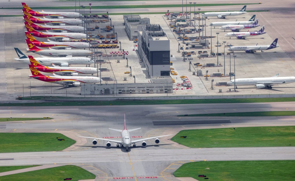 Hong Kong airport. The 34-year-old victim is suspected to have fallen out of a tow truck. Photo: Jelly Tse Hong Kong airport. The 34-year-old victim is suspected to have fallen out of a tow truck. Photo: Jelly Tse