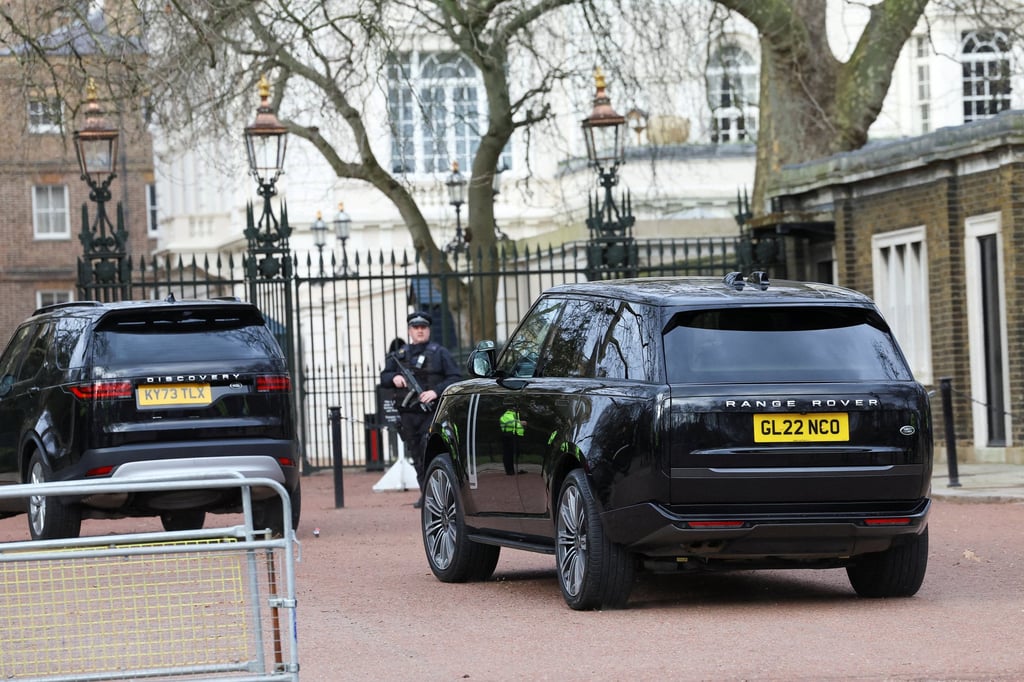 A car believed to be transporting Britain’s Prince Harry enters Clarence House, the home of King Charles, in London on Tuesday. Photo: Reuters