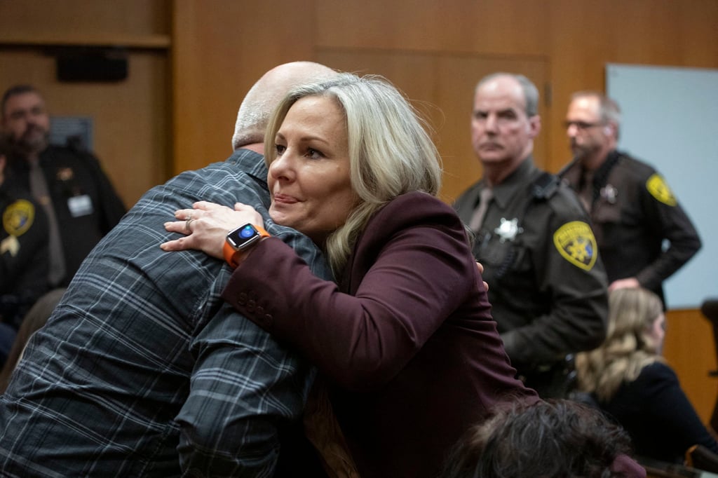 Oakland County Prosecutor Karen McDonald hugs Craig Shilling, the father of victim Justin Shilling, after a jury found Jennifer Crumbley guilty on four counts of involuntary manslaughter on Tuesday. Photo: AFP Oakland County Prosecutor Karen McDonald hugs Craig Shilling, the father of victim Justin Shilling, after a jury found Jennifer Crumbley guilty on four counts of involuntary manslaughter on Tuesday. Photo: AFP