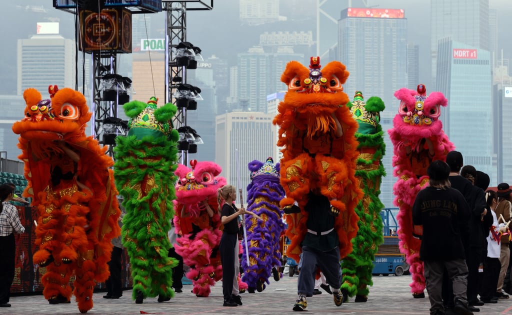A group rehearses for the parade’ in Tsim Sha Tsui. Photo: May Tse A group rehearses for the parade’ in Tsim Sha Tsui. Photo: May Tse