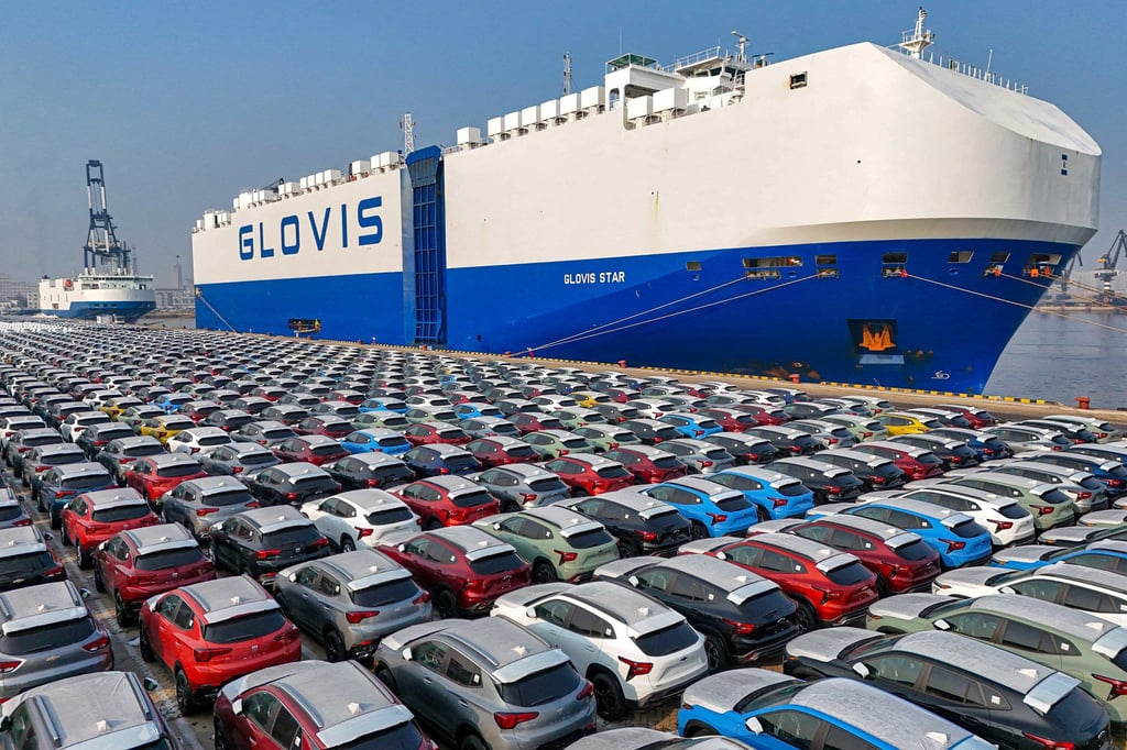 Cars wait to be loaded onto a ship for export at the port in Yantai, in China’s Shandong province, on January 2, 2024. Photo: AFP