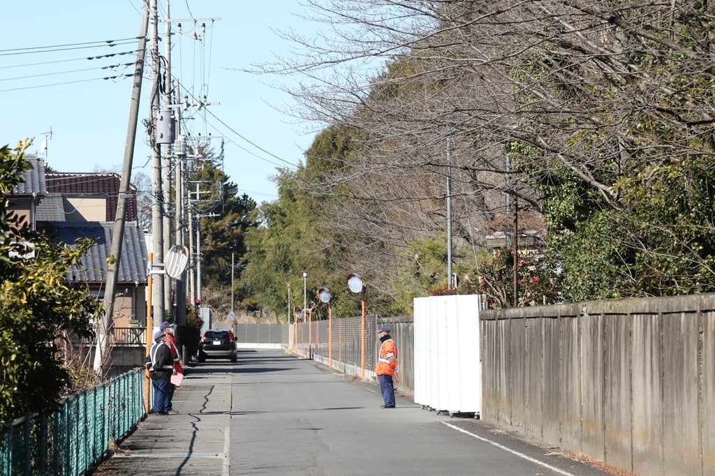 Guards block a road leading to the Gunma Prefectural Forest Park on January 29. Photo: EPA-EFE/Yonhap