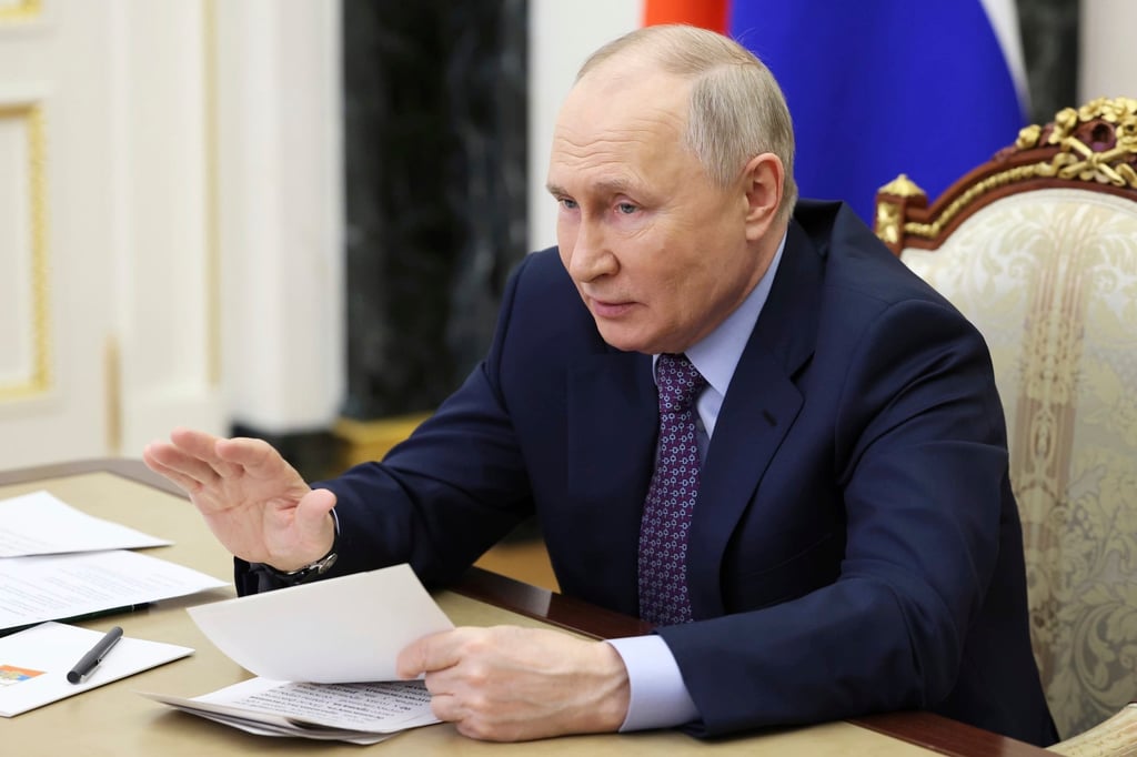 Russian President Vladimir Putin at the Kremlin in Moscow, Russia on Thursday. Photo: Alexander Kazakov, Sputnik, Kremlin Pool Photo via AP Russian President Vladimir Putin at the Kremlin in Moscow, Russia on Thursday. Photo: Alexander Kazakov, Sputnik, Kremlin Pool Photo via AP