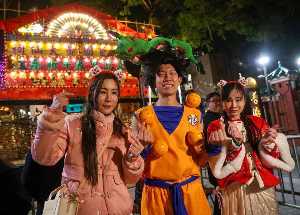 (From left) Worshippers Amy Ie, Paper Kwai and Crystal Li. The trio are among the early birds waiting in line at Wong Tai Sin Temple on Lunar New Year’s Eve. Photo: Yik Yeung-man (From left) Worshippers Amy Ie, Paper Kwai and Crystal Li. The trio are among the early birds waiting in line at Wong Tai Sin Temple on Lunar New Year’s Eve. Photo: Yik Yeung-man