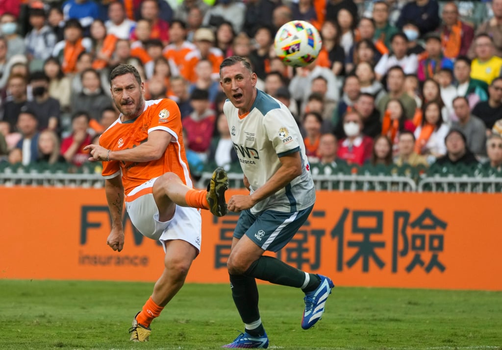 Francesco Totti of the World Legends tries a shot at Hong Kong Stadium on Tuesday. Photo: Sam Tsang Francesco Totti of the World Legends tries a shot at Hong Kong Stadium on Tuesday. Photo: Sam Tsang