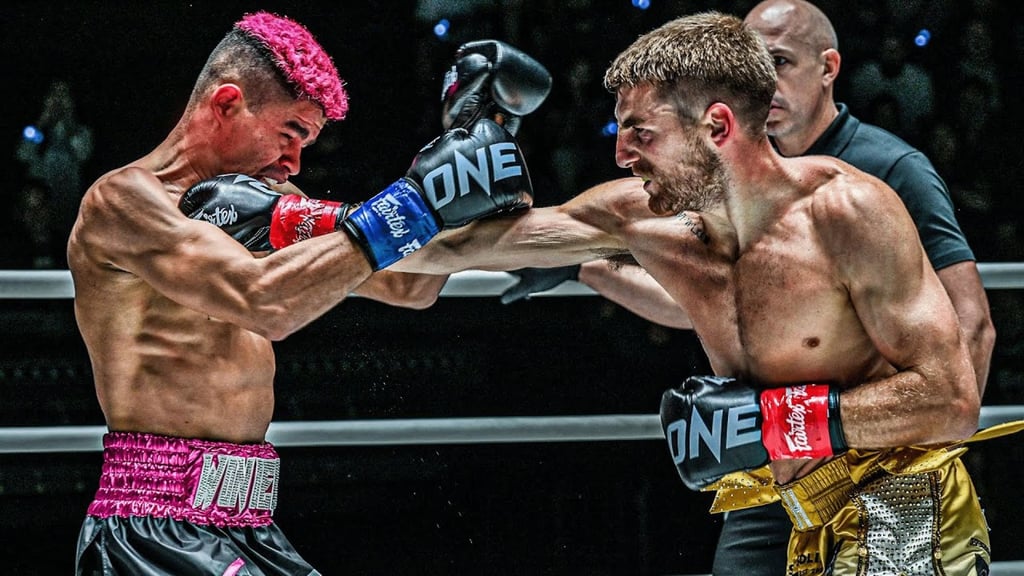 Jonathan Haggerty punches Fabricio Andrade during their kickboxing clash at ONE Fight Night 16. Photo: ONE Championship