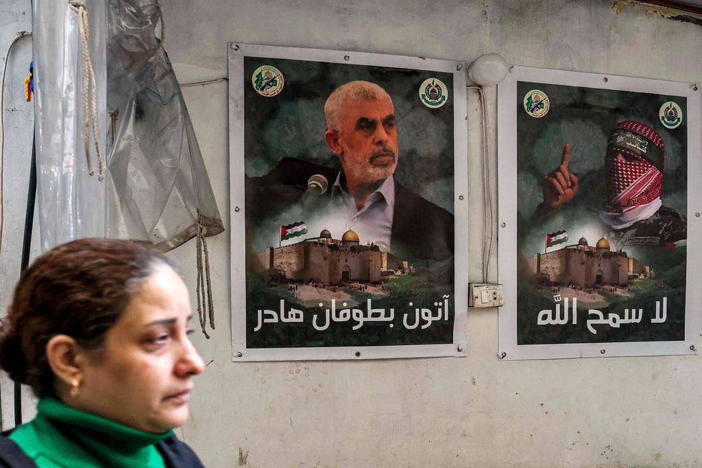 Posters in Beirut, Lebanon, depict Yahya Sinwar (left), the head of the political wing of Hamas, and Abu Obeida (right), the masked spokesman of Hamas’ armed wing. Photo: AFP