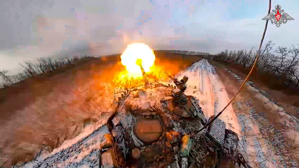 A Russian tank fires at an undisclosed location in Ukraine. Photo: Russian Defence Ministry Press Service via AP
