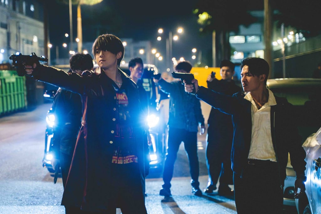 Mirror member Keung To (left) in a scene from The Moon Thieves, which shot up to No 2 over the Lunar New Year.