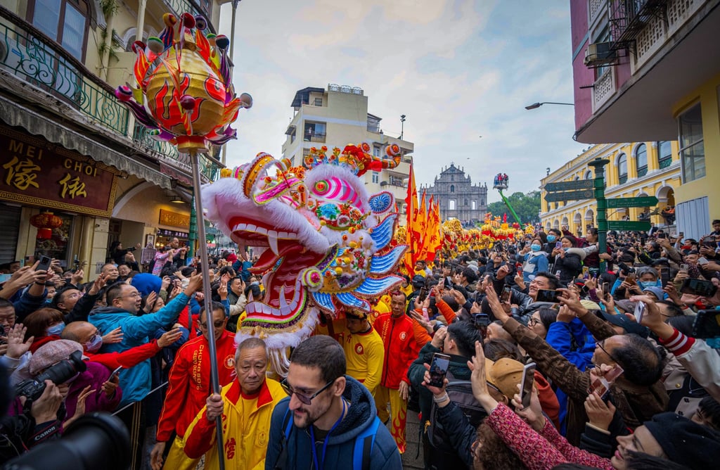 Artists perform a dragon dance to celebrate the Chinese Lunar New Year in front of the Ruins of St. Paul’s in south China’s Macao on Feb. 10, 2024. On the first day of the Year of the Dragon, touring performances organized by the Macao Government Tourism Office were staged at the Ruins of St. Paul’s and the Senado Square to celebrate the Chinese Lunar New Year. A 238-meter-long “dancing golden dragon” also toured multiple major scenic spots of Macao. Photo: Xinhua Artists perform a dragon dance to celebrate the Chinese Lunar New Year in front of the Ruins of St. Paul’s in south China’s Macao on Feb. 10, 2024. On the first day of the Year of the Dragon, touring performances organized by the Macao Government Tourism Office were staged at the Ruins of St. Paul’s and the Senado Square to celebrate the Chinese Lunar New Year. A 238-meter-long “dancing golden dragon” also toured multiple major scenic spots of Macao. Photo: Xinhua