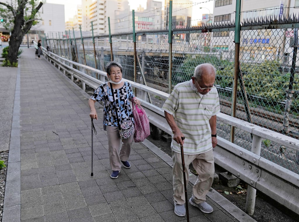 Elderly people walk in Tokyo. More Japanese are protesting that the money earmarked for Ukraine would be better spent on the elderly. Photo: Xinhua