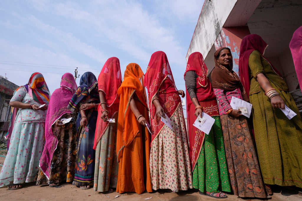 Women queue to cast their votes in Chachiyawas village, near Ajmer, India, in November. File photo: AP Women queue to cast their votes in Chachiyawas village, near Ajmer, India, in November. File photo: AP
