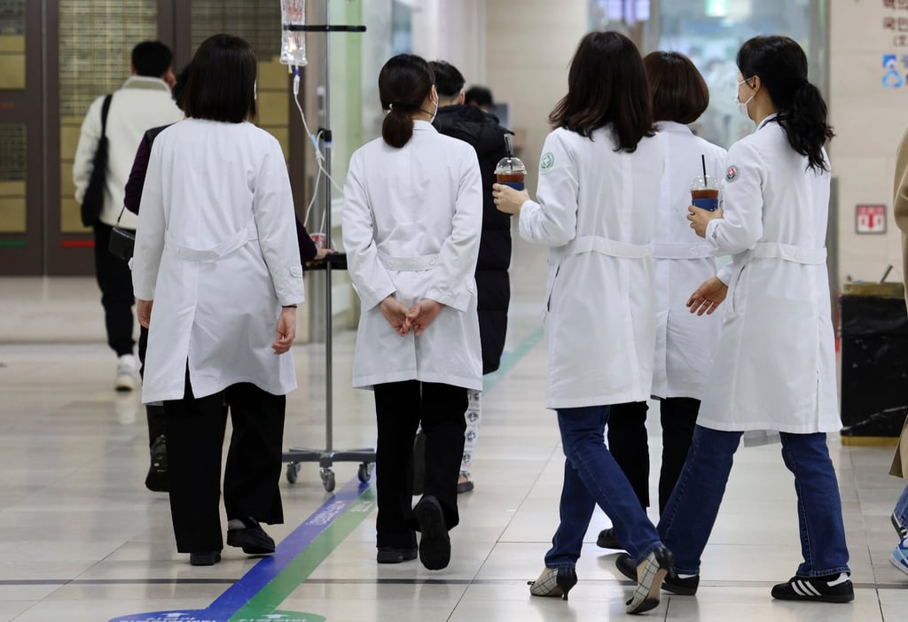 Medical workers walk inside a general hospital in Gwangju. Health authorities say it is urgent to have more doctors, considering South Korea’s fast-ageing population. Photo: AP Medical workers walk inside a general hospital in Gwangju. Health authorities say it is urgent to have more doctors, considering South Korea’s fast-ageing population. Photo: AP