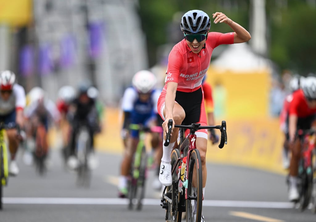 Hong Kong’s Yang Qianyu crosses the finish line in Hangzhou. Photo: Xinhua Hong Kong’s Yang Qianyu crosses the finish line in Hangzhou. Photo: Xinhua