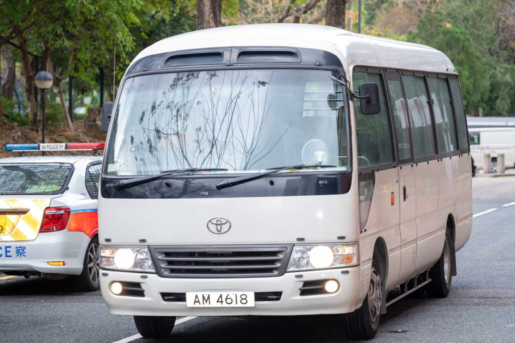 A bus believed to be carrying Wang Qingxia enters Sha Tin Court for the hearing. Photo: Handout A bus believed to be carrying Wang Qingxia enters Sha Tin Court for the hearing. Photo: Handout